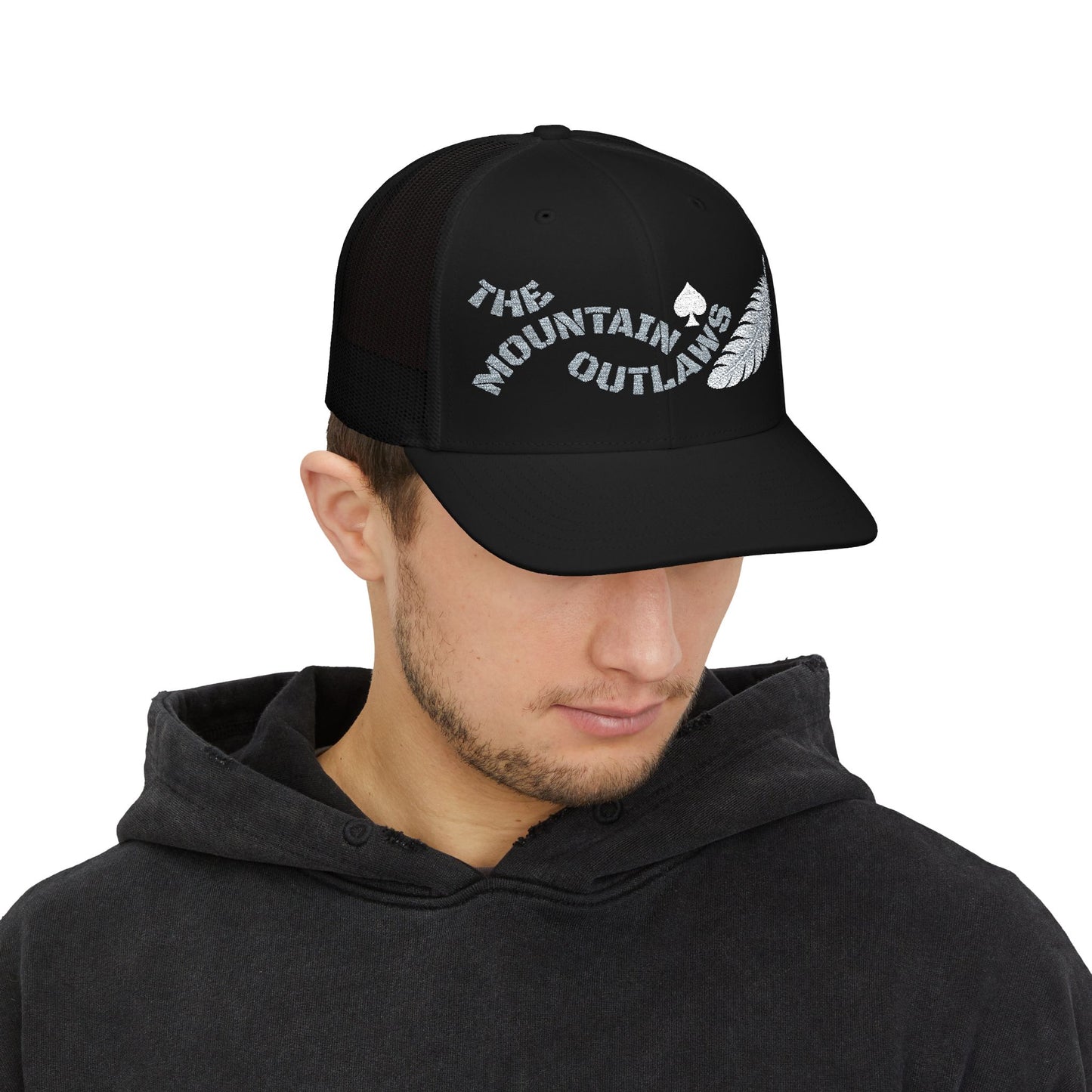 The Mountain Outlaws™ Feather & Spade Trucker Hat