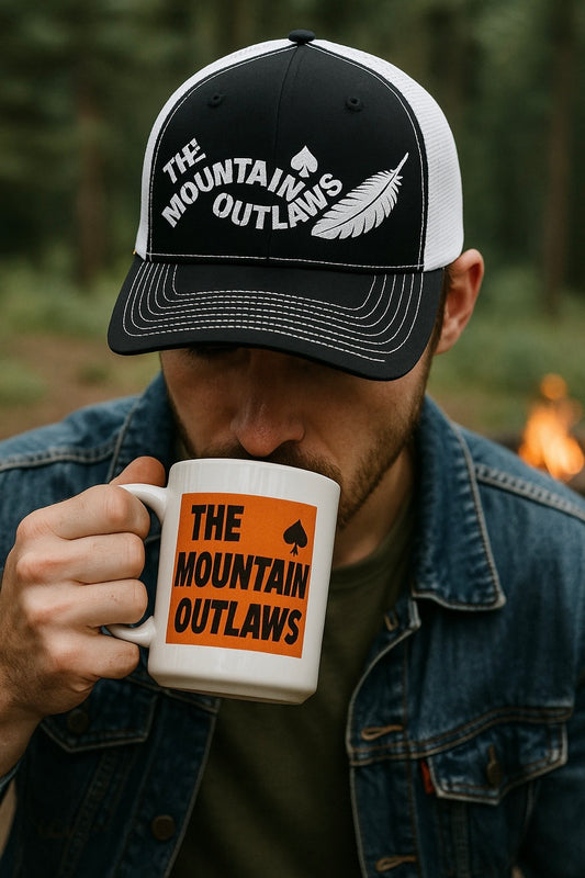 The Mountain Outlaws™ Feather & Spade Trucker Hat